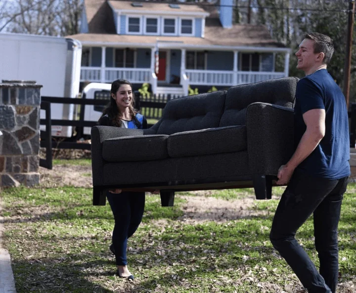 Carrying a used couch out of house for donation